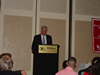 Dr. Andrew Jackson at the podium, Dr. Jackson received The Distinguished Service Award