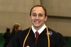  Smiles for the camera -An HHP student at Commencement 2009