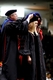 Kristen McAlexander being hooded  