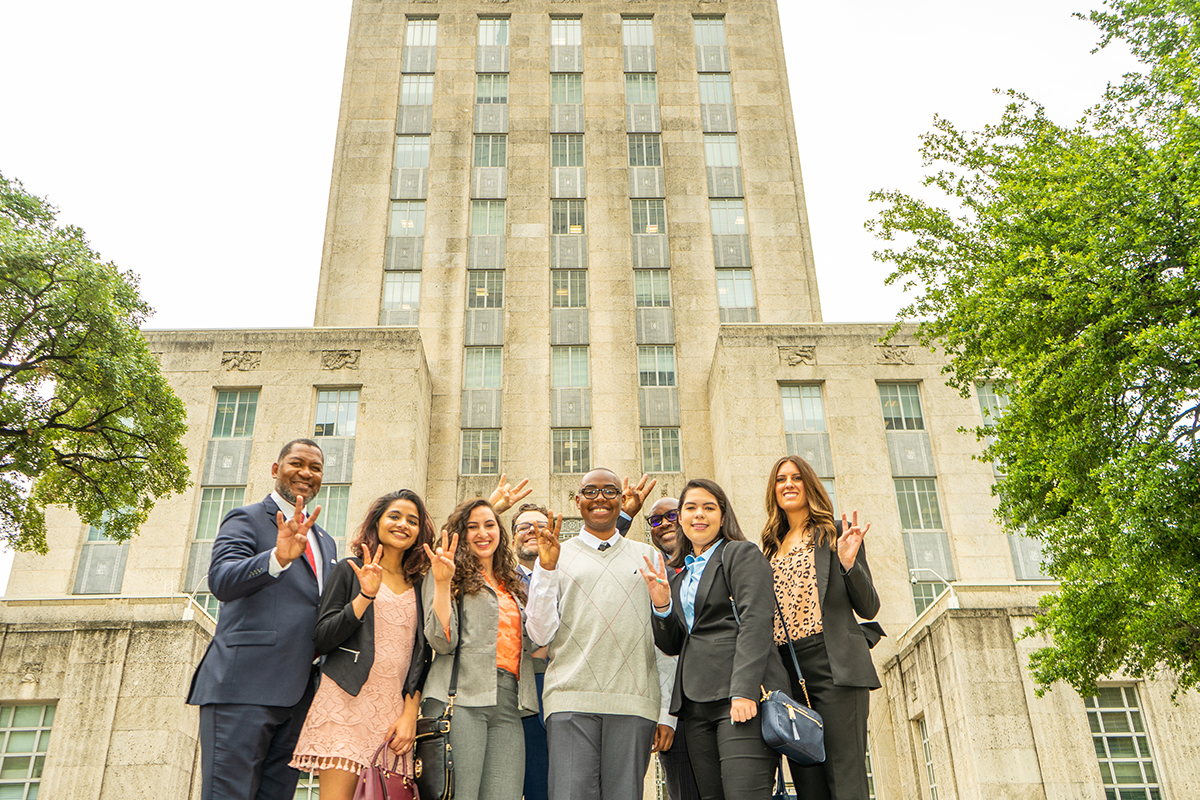 Dean Tillis, CLASS associate deans Drs. Billy Hawkins and Todd Romero, student interns Anu Thomas, Samantha Annab, London Douglas, Jessica Ortega, and Brittney Wallace outside of City Hall.