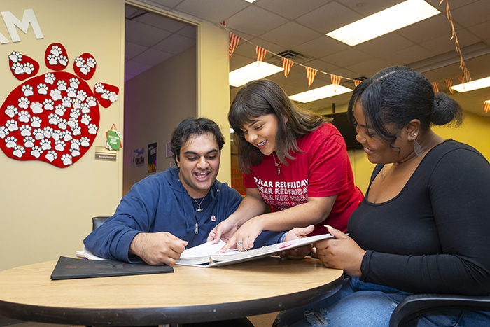 teacher outside classroom door