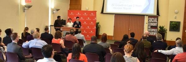 A group presentation in front of crowd