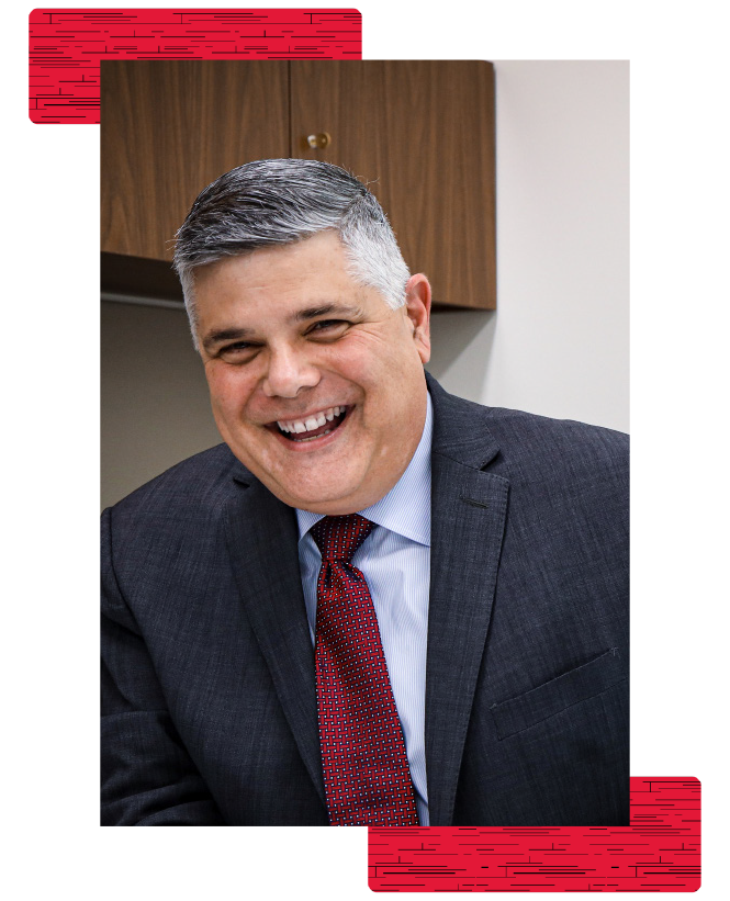 Portrait of  a man in a suit smiling