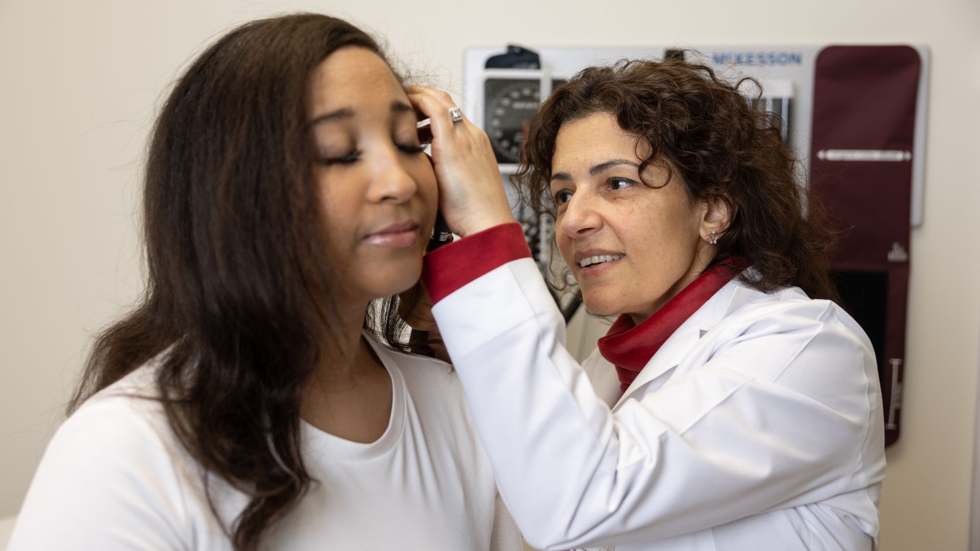 Dr. Grair in a clinical setting