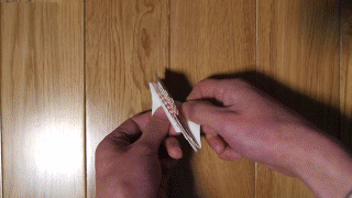 Folding of paper in Miura-ori pattern