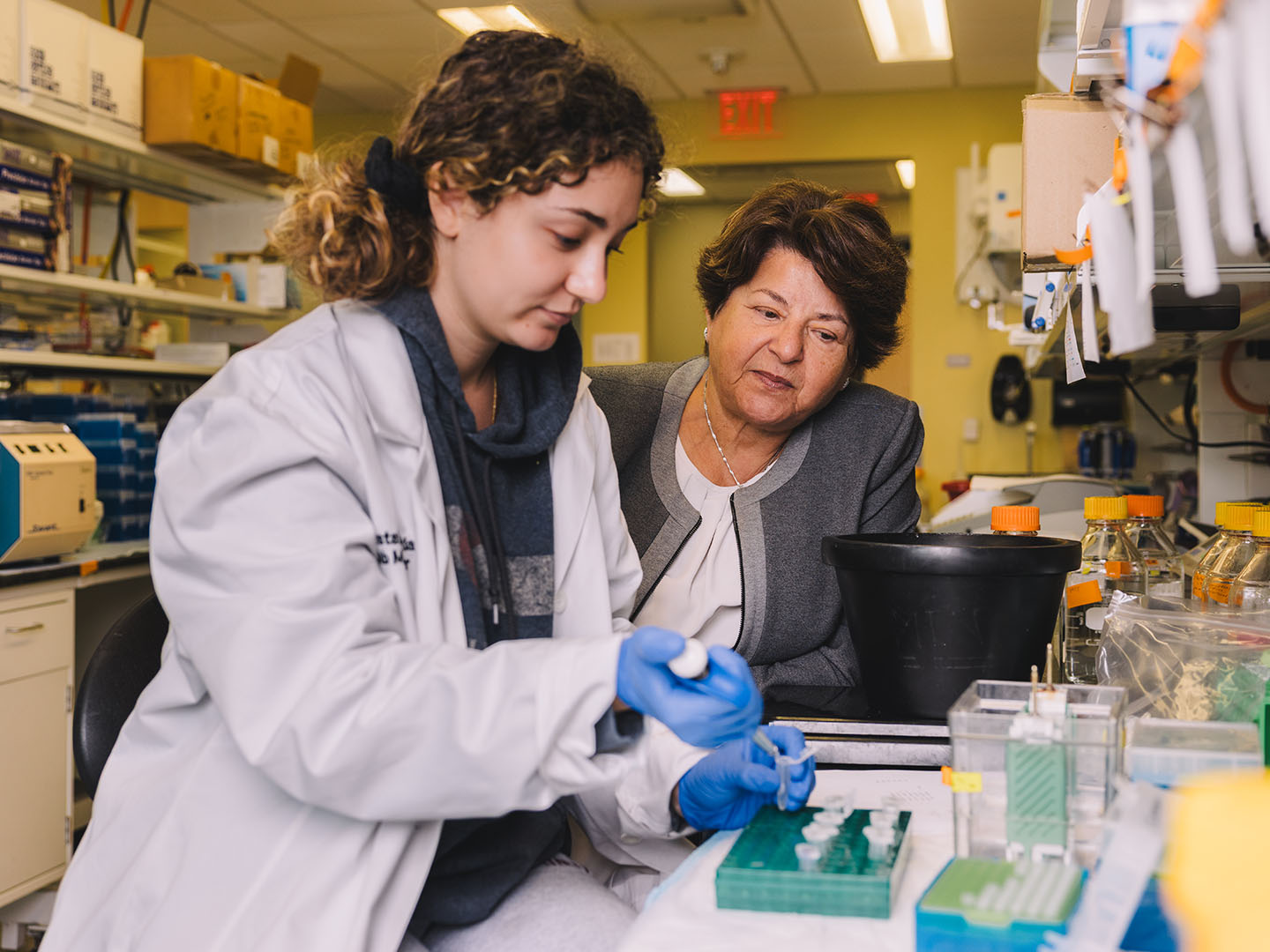 muna nash with one of her research students in the lab