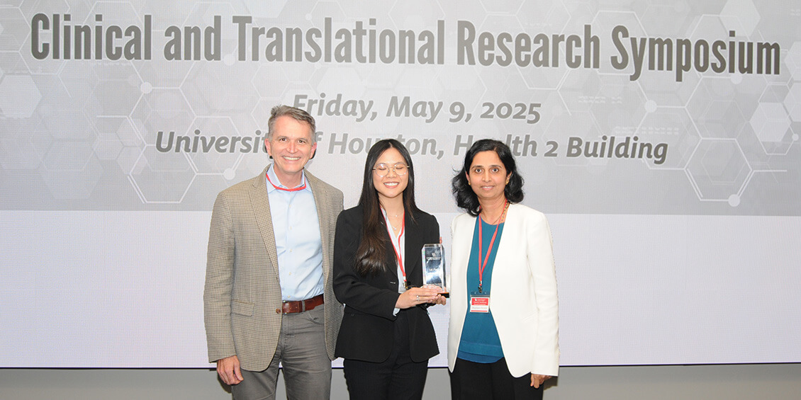harris and trivedi with huang podium winner
