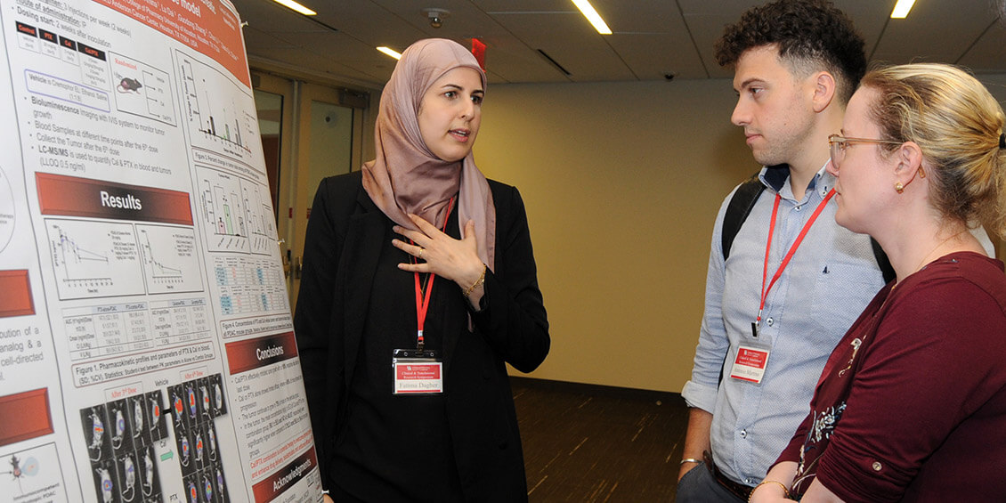 poster presenter and attendees