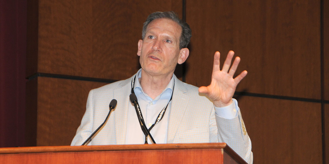 mbcc keynote presenter guttridge at podium