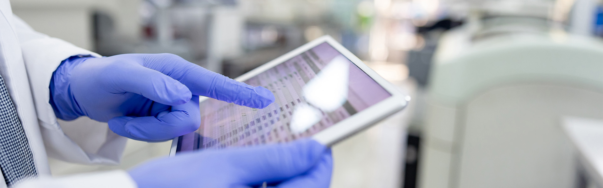 lab scientist with digital tablet