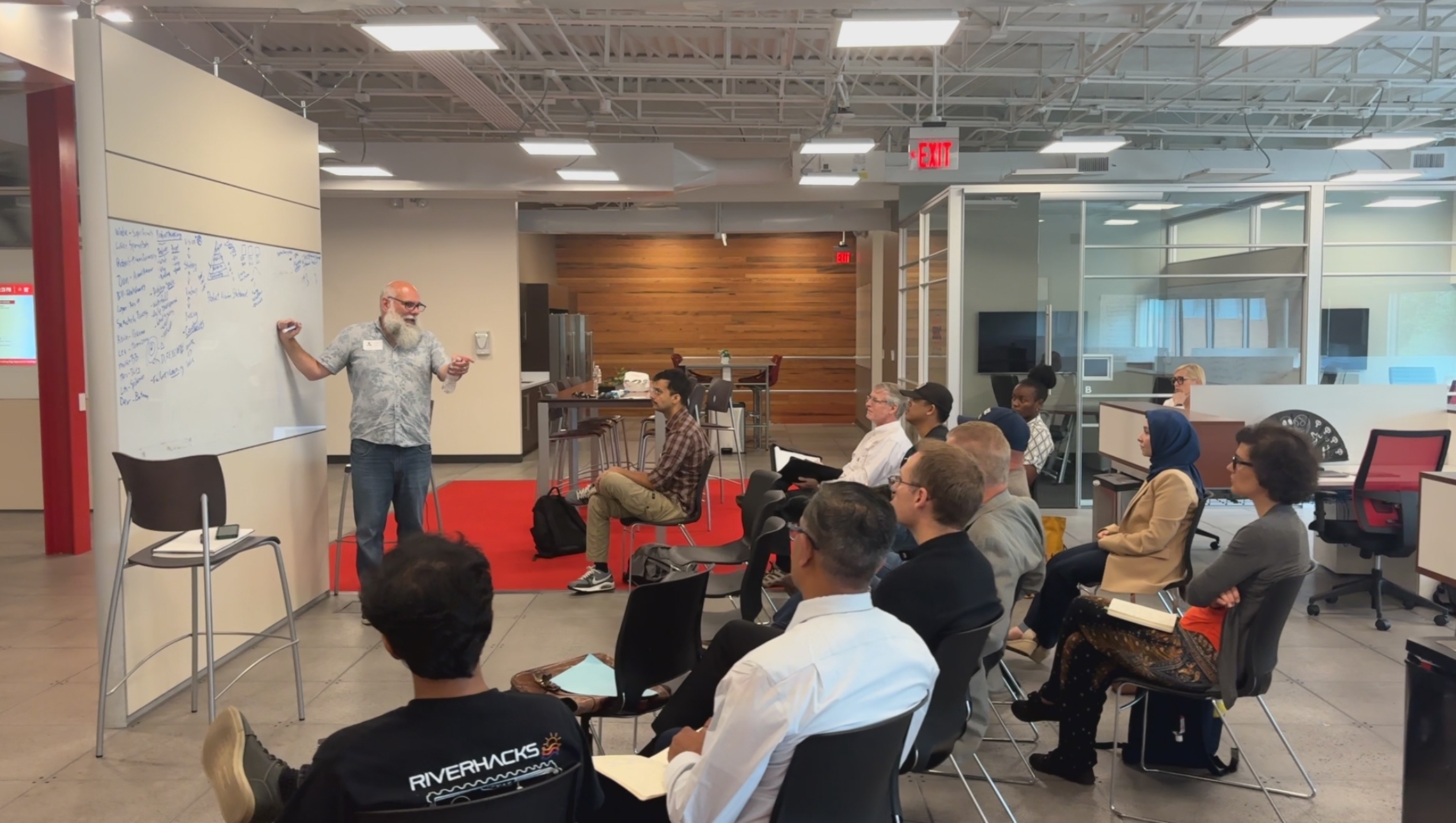 Startup mentor Wade Pinder gives the cohort tips on product management